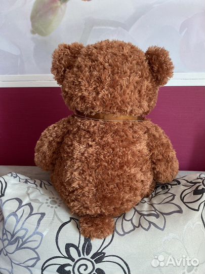 Большой плюшевый мишка