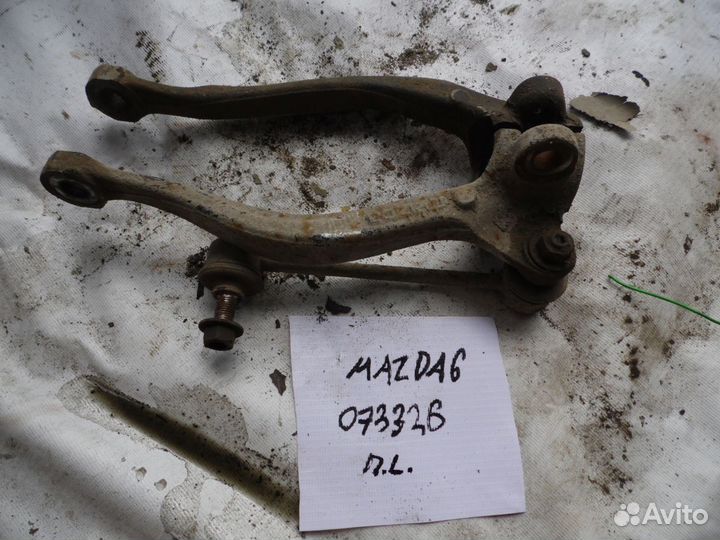 Кронштейн амортизатора (передний левый) Mazda Mazd