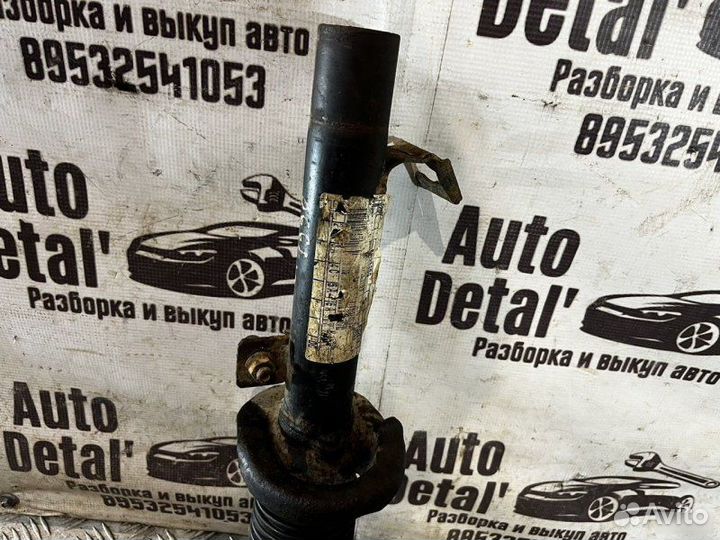 Стойка амортизатора передняя левая Ford Fiesta 5