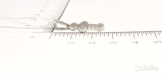 Золотая подвеска с камнем