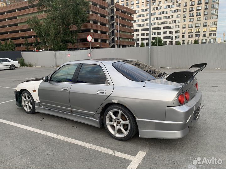 Nissan Skyline 2.0 AT, 1997, 207 345 км