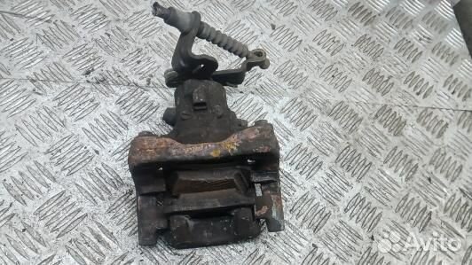 Суппорт тормозной задний левый skoda octavia A7 (K