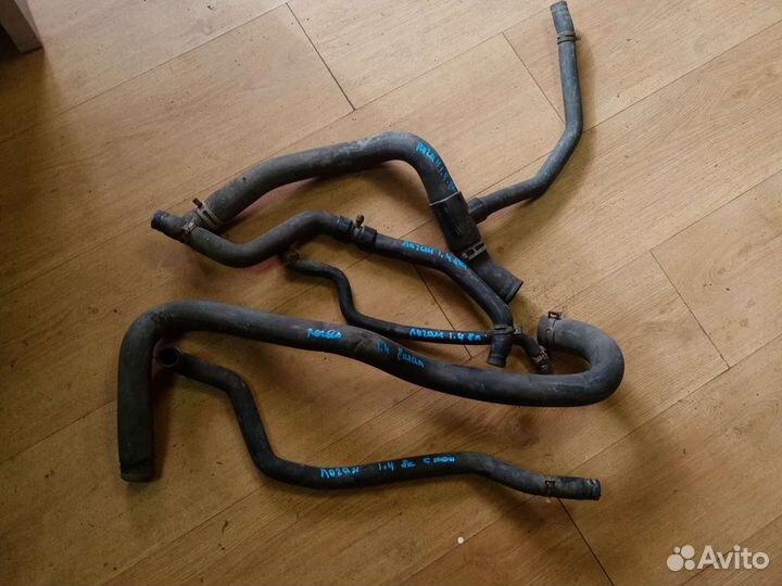 Патрубки системы охлаждения. Логан 1.4