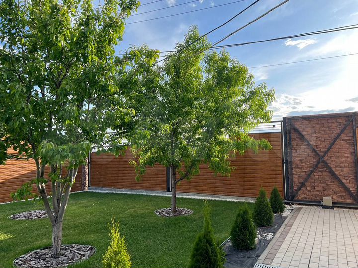 Коттедж 327 м² на участке 11 сот.