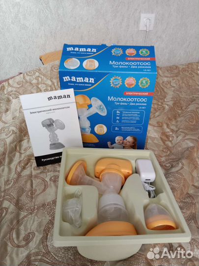 Молокоотсос электрический новый