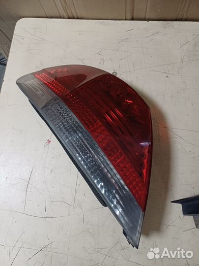Фонарь задний левый наружный bmw e65/66