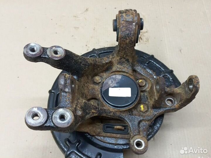 Кулак задний левый Kia Sportage 3 SL 2wd