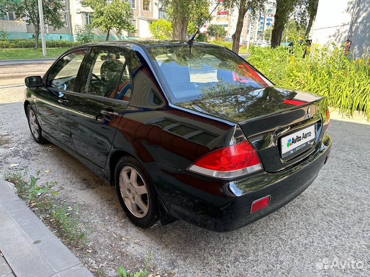 Mitsubishi Lancer 1.6 AT, 2005, 232 128 км