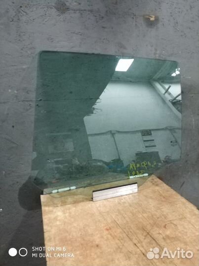 Стекло задней левой двери Опель Зафира Б