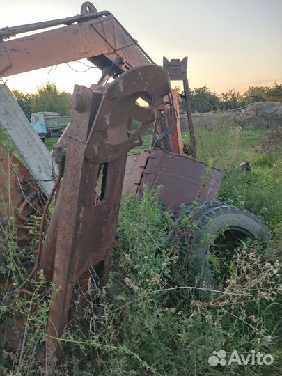 Грейферный погрузчик