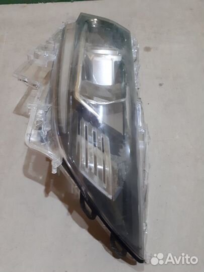 Стекло фары левой Toyota Land Cruiser Prado 150