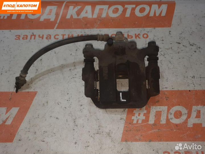 Суппорт тормозной задний левый Nissan X-Trail T31