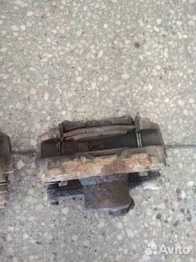 Суппорт тормозной передний Поло Седан