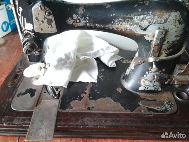 Швейная машинка Зингер
