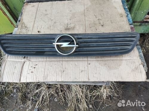 Решетка радиатора Opel Astra G