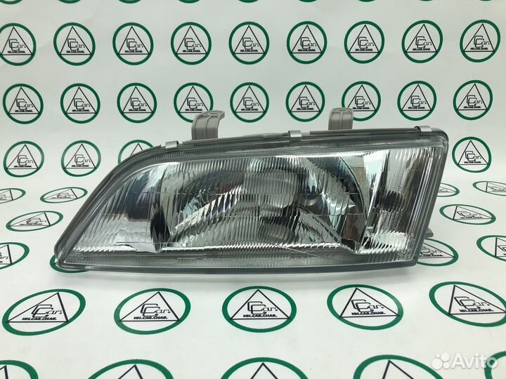 Фара основная левая для Nissan Primera II P11