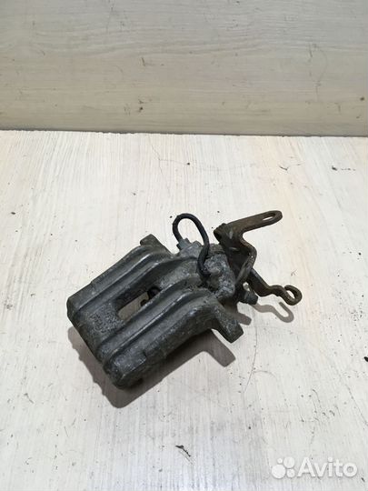 Суппорт задний левый Шкода Октавия A5