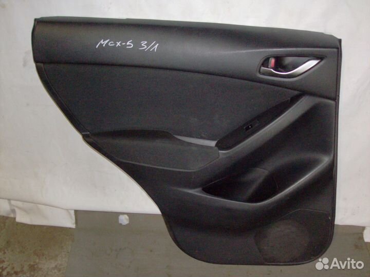 Задняя левая обшивка двери Mazda CX5