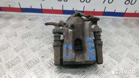 Суппорт тормозной задний левый toyota corolla E15