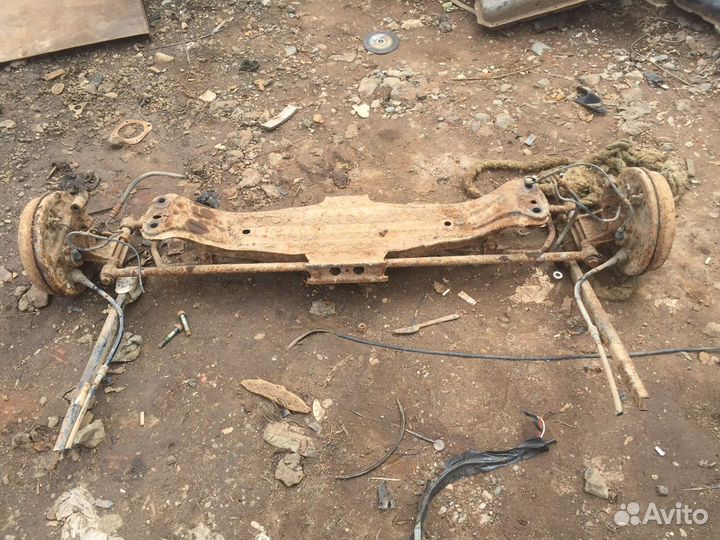 Подрамник задний мазда 626