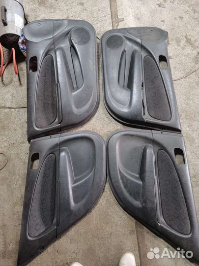 Дверные карты corolla e110