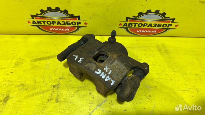 Суппорт тормозной задний Mitsubishi Lancer IX