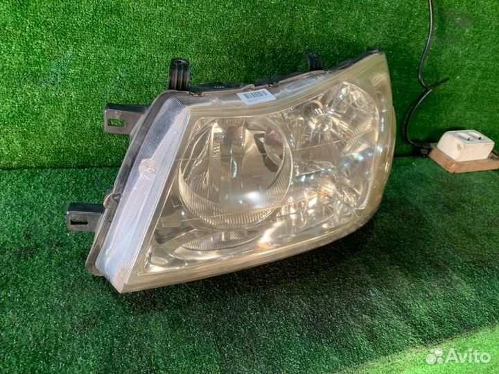Фара передняя левая Nissan Liberty RM12