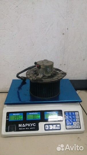 Моторчик отопителя LADA Kalina