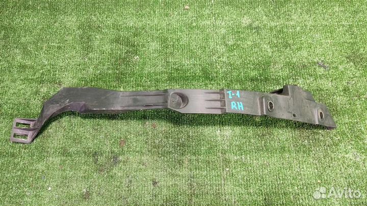 Кронштейн бампера переднего правый Opel Astra J 2