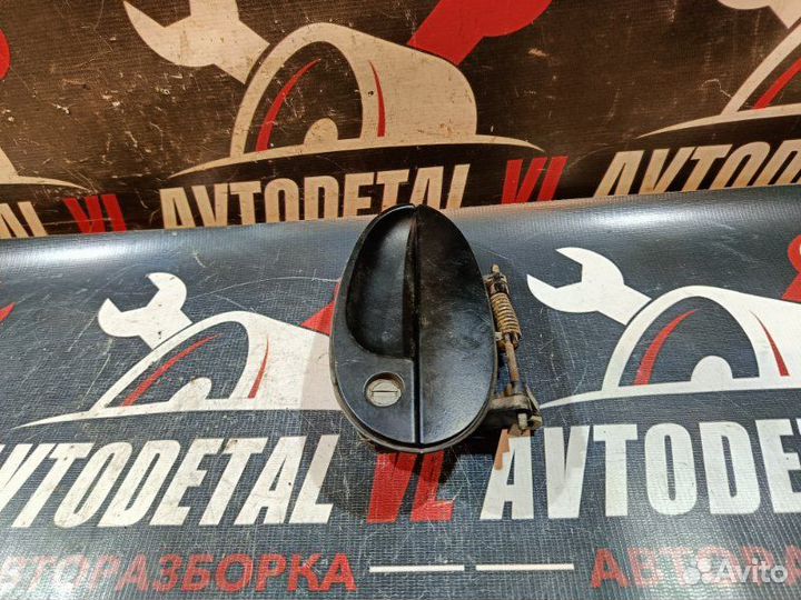 Ручка открывания двери наружная передняя левая