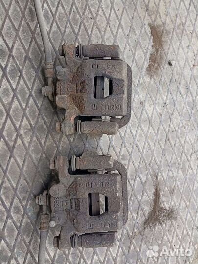 Суппорт тормозной задний Nissan Qashqai J10 06-13г