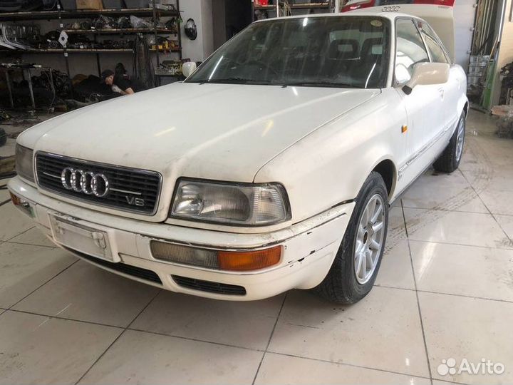 Кронштейн глушителя правый Audi 80 B4 ABC 1994