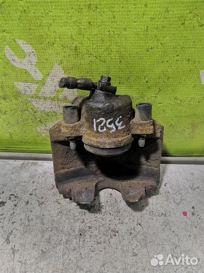 Суппорт передний левый Фольксваген Пассат Б6