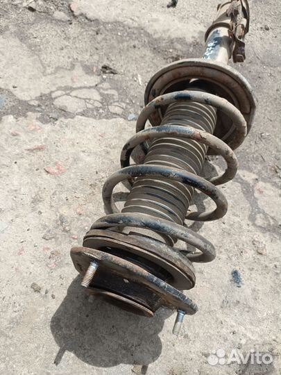 Передняя правая стойка Geely Emgrand EC7