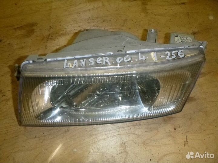 Фара левая mitsubishi lancer CB 1992-2000