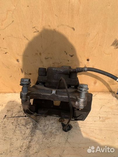 Тормозной суппорт Ауди А4 В8 передний левый