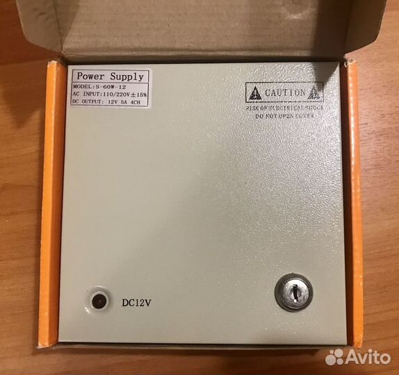 Блок питания на 4 камеры видеонаблюдения