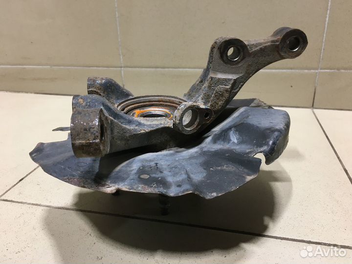 Кулак поворотный передний правый RIO 2005-2011