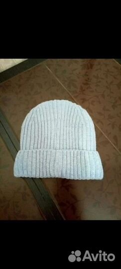 Женская вязаная шапка на флисе