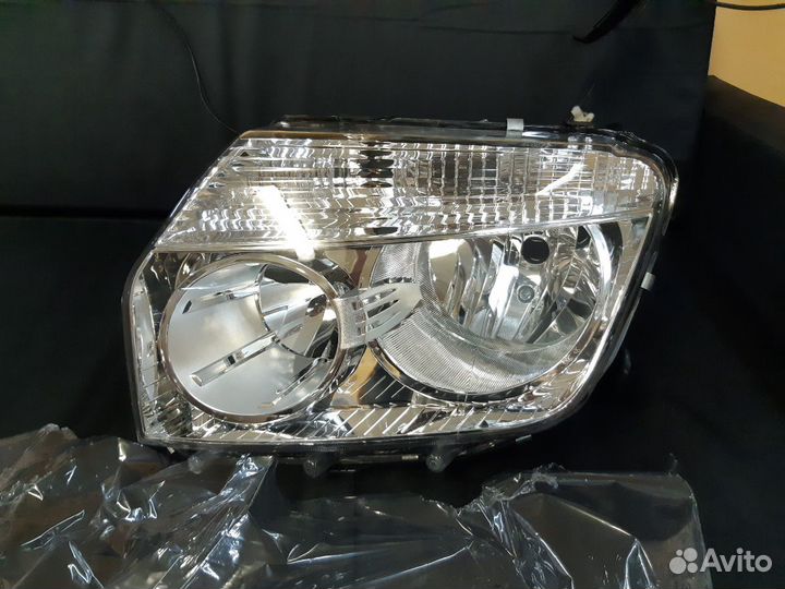 Фара левая Duster 2010-2014