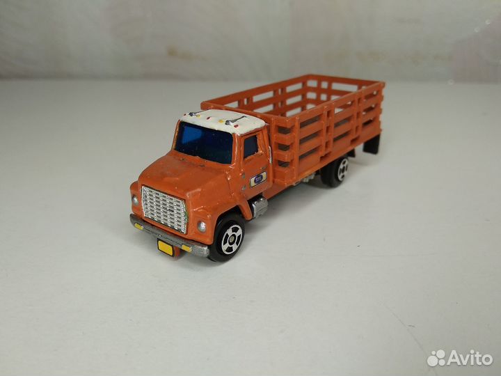 Грузовик американец высокий борт решетка