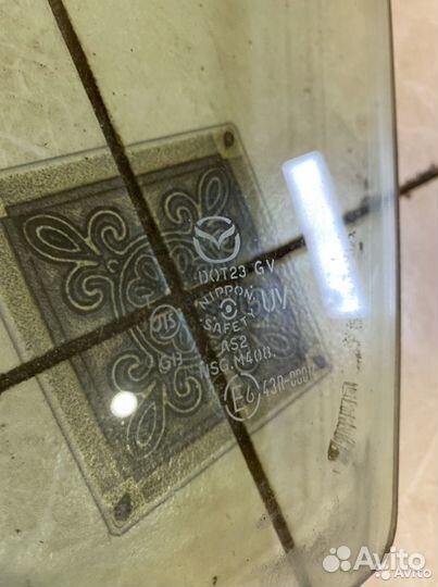 Стекло двери переднее левое Mazda сх7