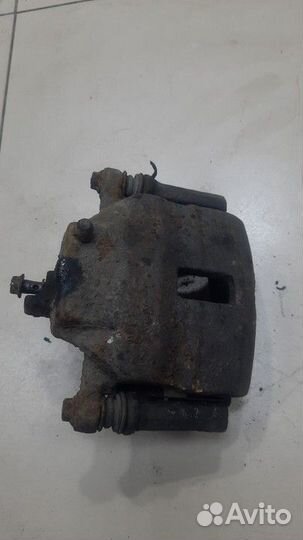 Суппорт передний правый Nissan Almera