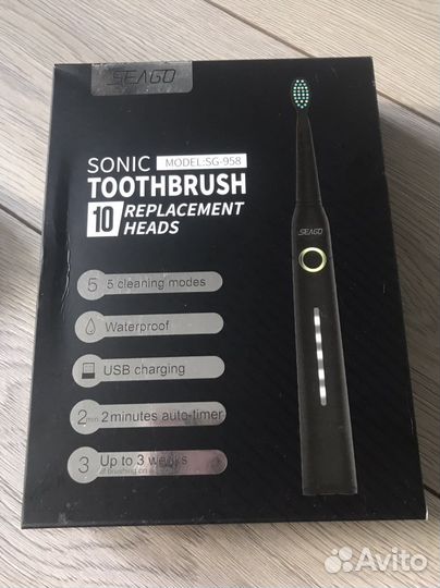 Электрическая зубная щетка новая