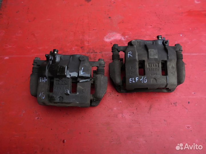 Isuzu ELF Суппорт тормозной передний 4HL1 L/R