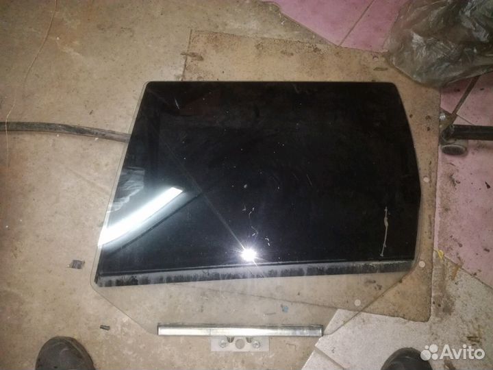 Стекло задней левой двери Нивы Шевролет