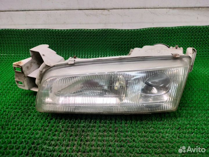 Фара передняя левая Mazda 626 GE FS 1995