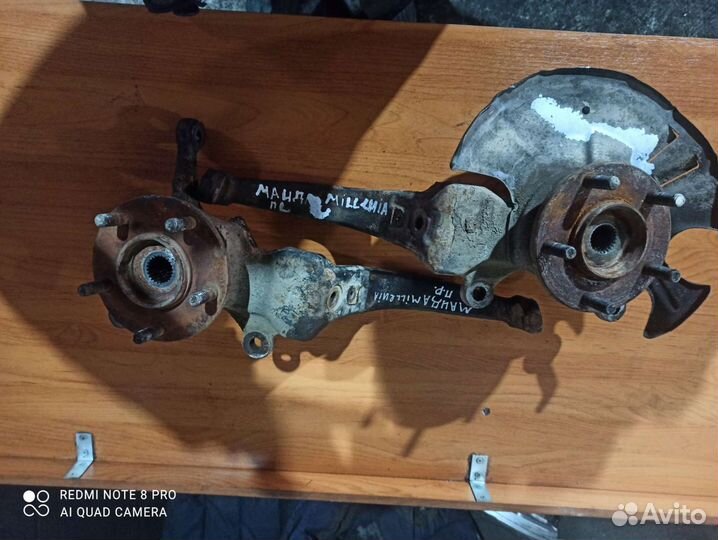 Кулак поворотный передний правый левый Mazda Mille