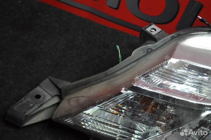 Фара левая toyota corolla fielder NKE165G