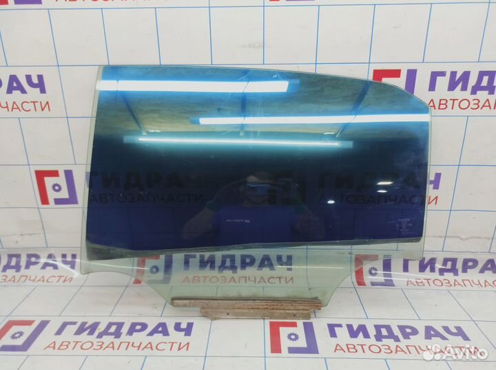 Стекло двери задней левой Toyota Corolla (E150) 68